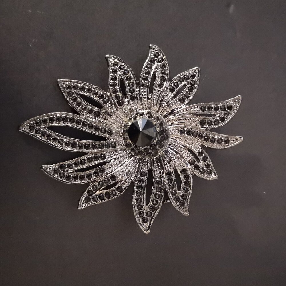 Silver Tone Flower Brooch with Black/Dark Purple Rhinestones Starburst Design